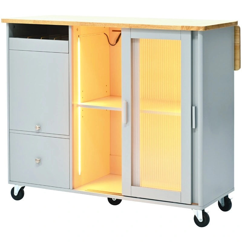 Carrello isola da cucina su ruote con piano ribaltabile, luce LED, 2 ante in vetro scanalato e 1 anta a ribalta