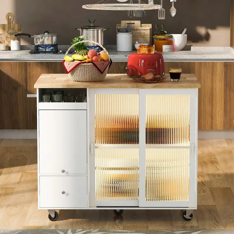 Wózek-wyspa kuchenna z opuszczanym blatem, oświetleniem LED, ryflowanymi szklanymi drzwiami, regulowaną półką i dwiema szufladami